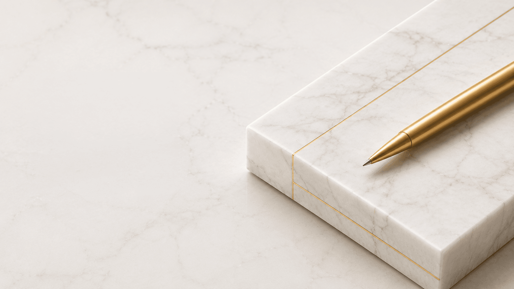 Marble block with gold pen + linework